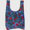 Reusable bag with red apple pattern on a blue background