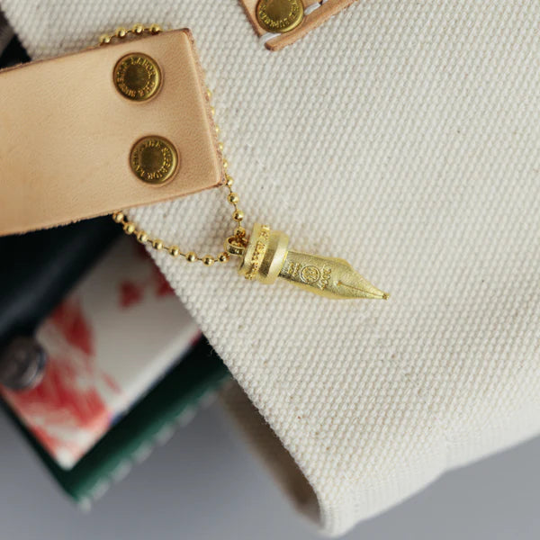 The Superior Labor Nib Charm